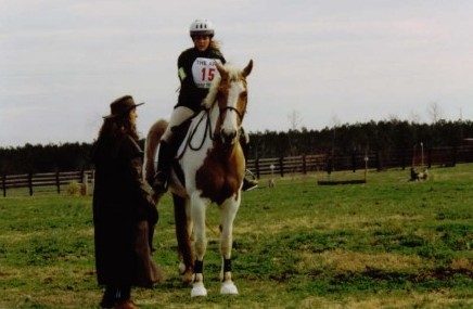 Getting a pep talk before XC from my high school trainer